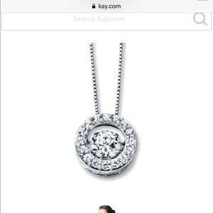 Kay Jeweler “Love in Motion” White Sapphire pendt